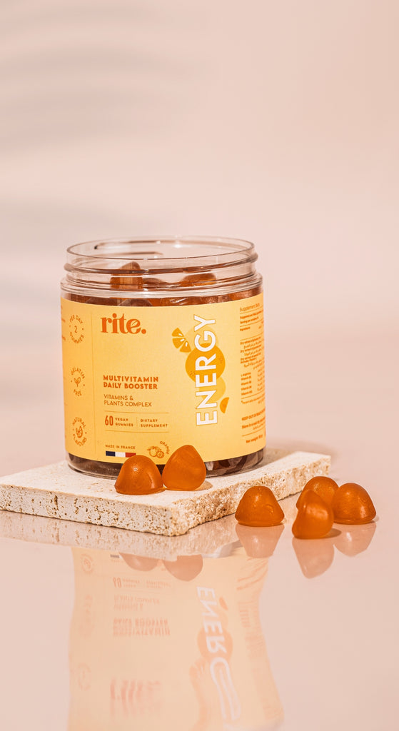 ENERGY GUMMIES from Rite shown in a bright orange jar, packed with vitamins and plant extracts to support daily energy and wellness.