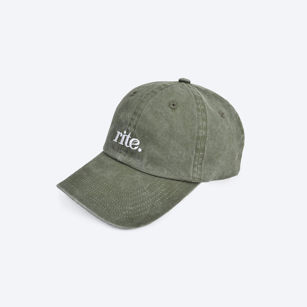 GREEN CAP with white embroidered rite. logo, curved brim, and soft washed fabric for casual wear