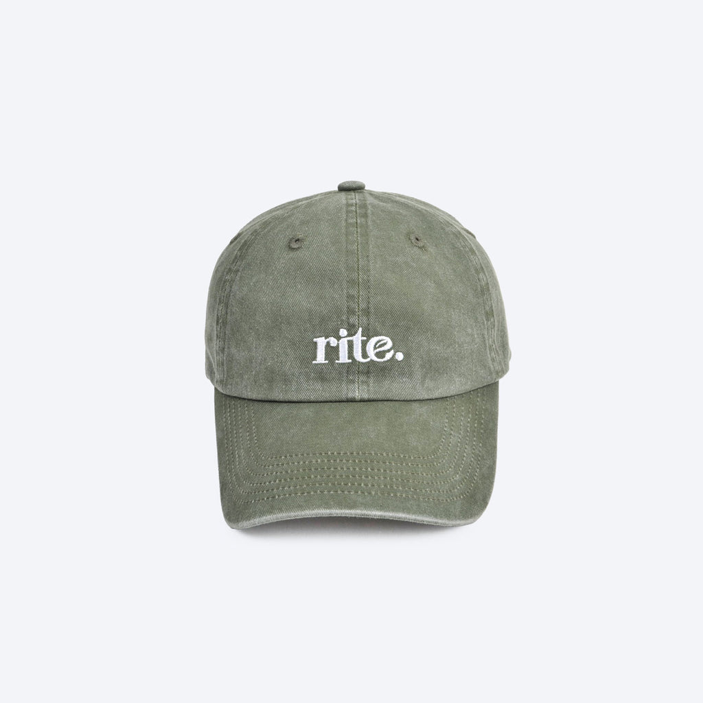 GREEN CAP with white embroidered rite. logo, curved brim, and soft washed fabric for casual wear