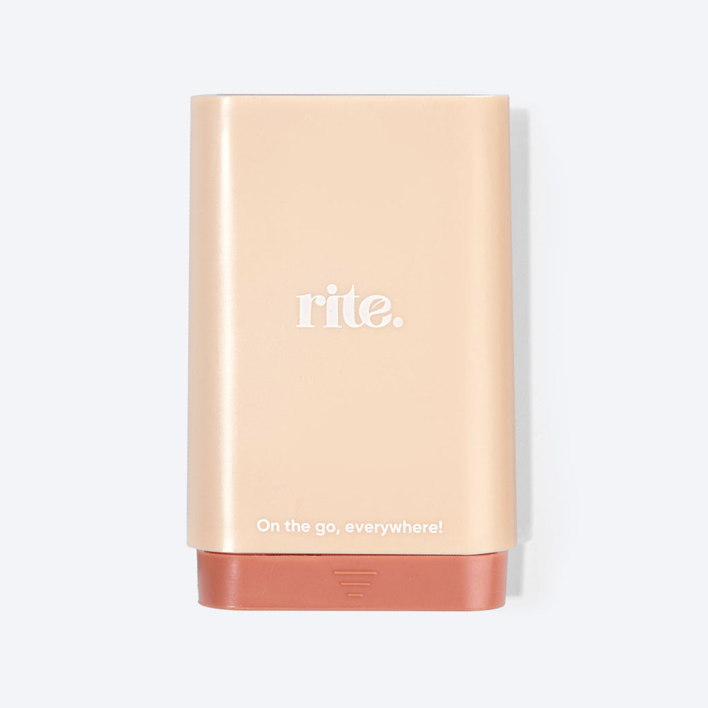 Beige and terracotta RITE. branded portable GUMMIES DISPENSER with text "On the go, everywhere.