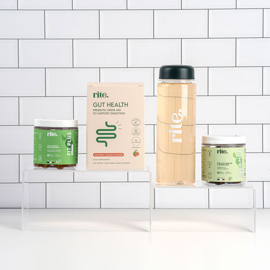 GUT HEALTH SUPPLEMENTS Prebiotic Drink, FIT PLUS and BALANCE gummies, and a RITE hydration bottle on a tiled background