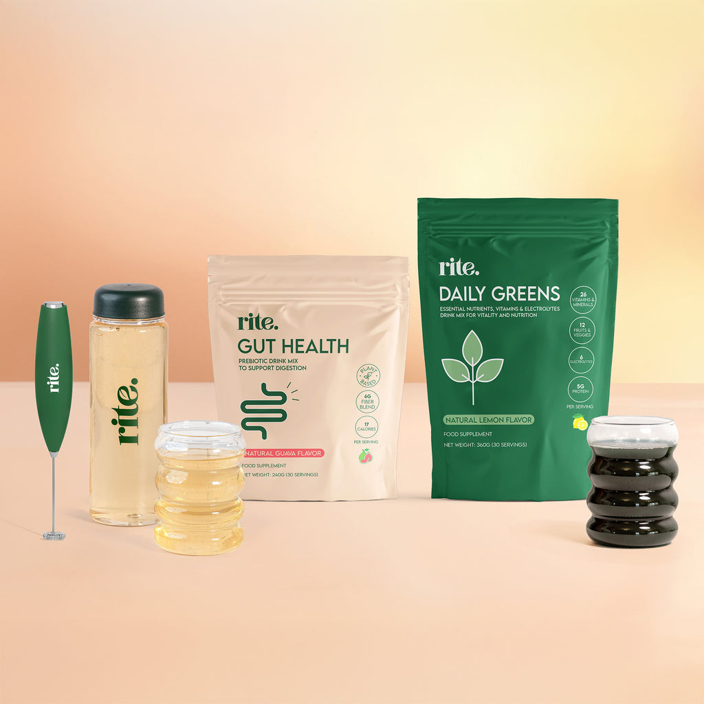 GUT HEALTH and DAILY GREENS powder with electric whisk and bottle – Nutrition drink mixes for digestion, energy, and vitality.