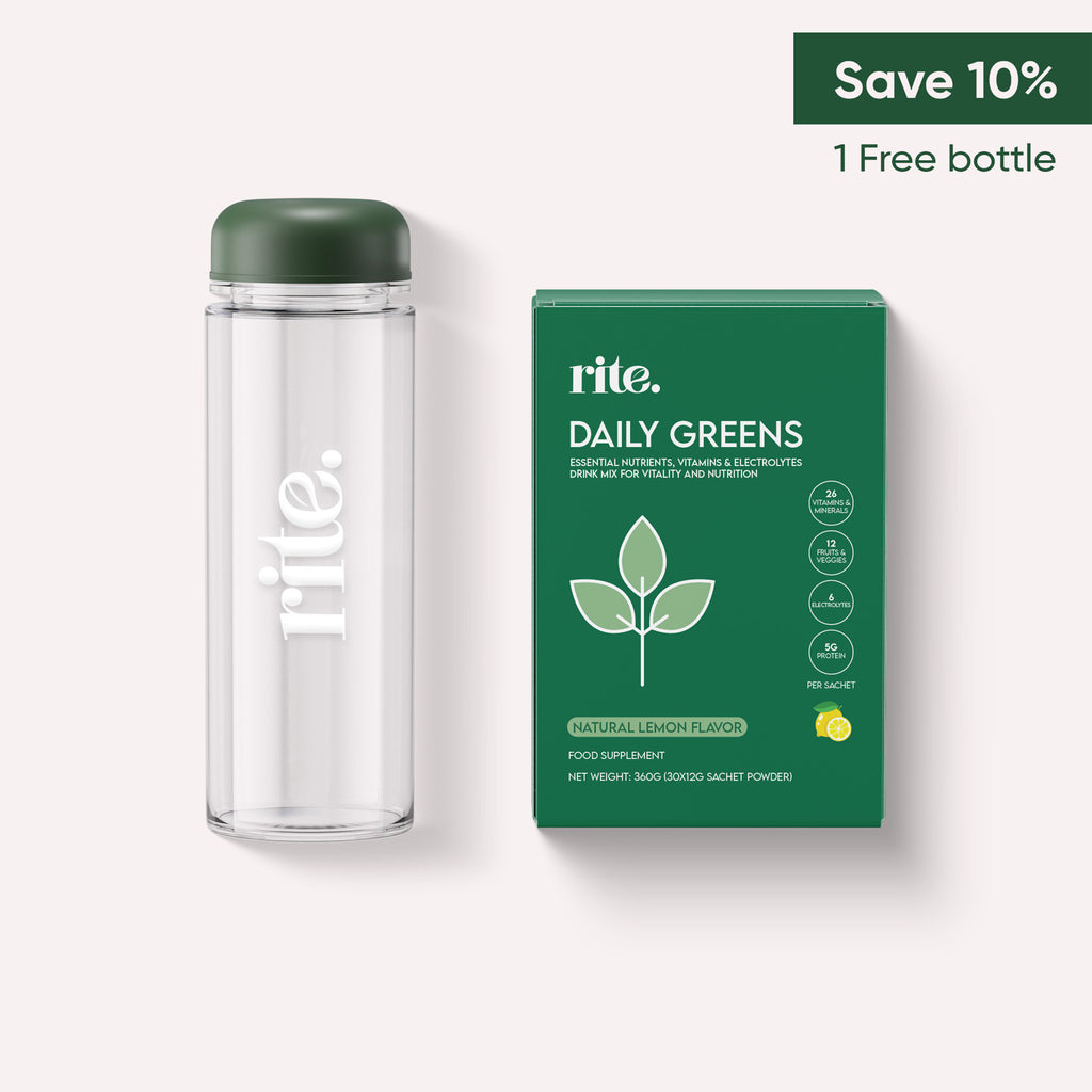 A green bottle with a green cap and a green box of Rite Daily Greens with lemon flavor on a white background. The box has a "Save 10% and 1 Free Bottle" offer.