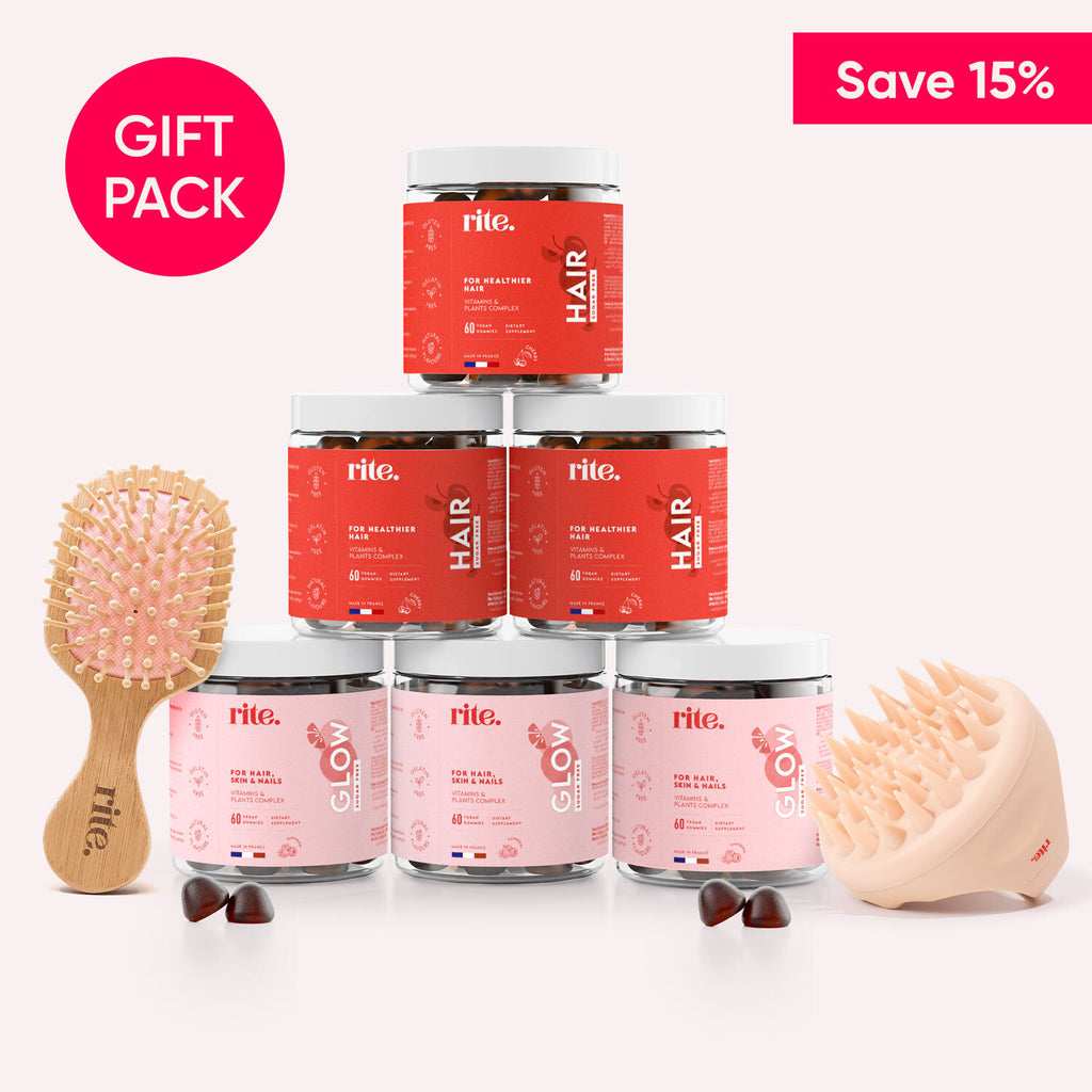 A gift pack of Rite HAIR Gummies, a hairbrush and scalp on a white background.