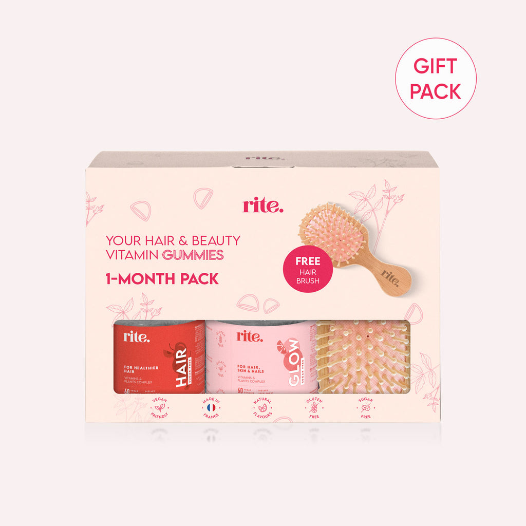HAIR & GLOW GUMMIES gift pack offers daily beauty vitamins for hair, skin, and nails with a wooden hairbrush.