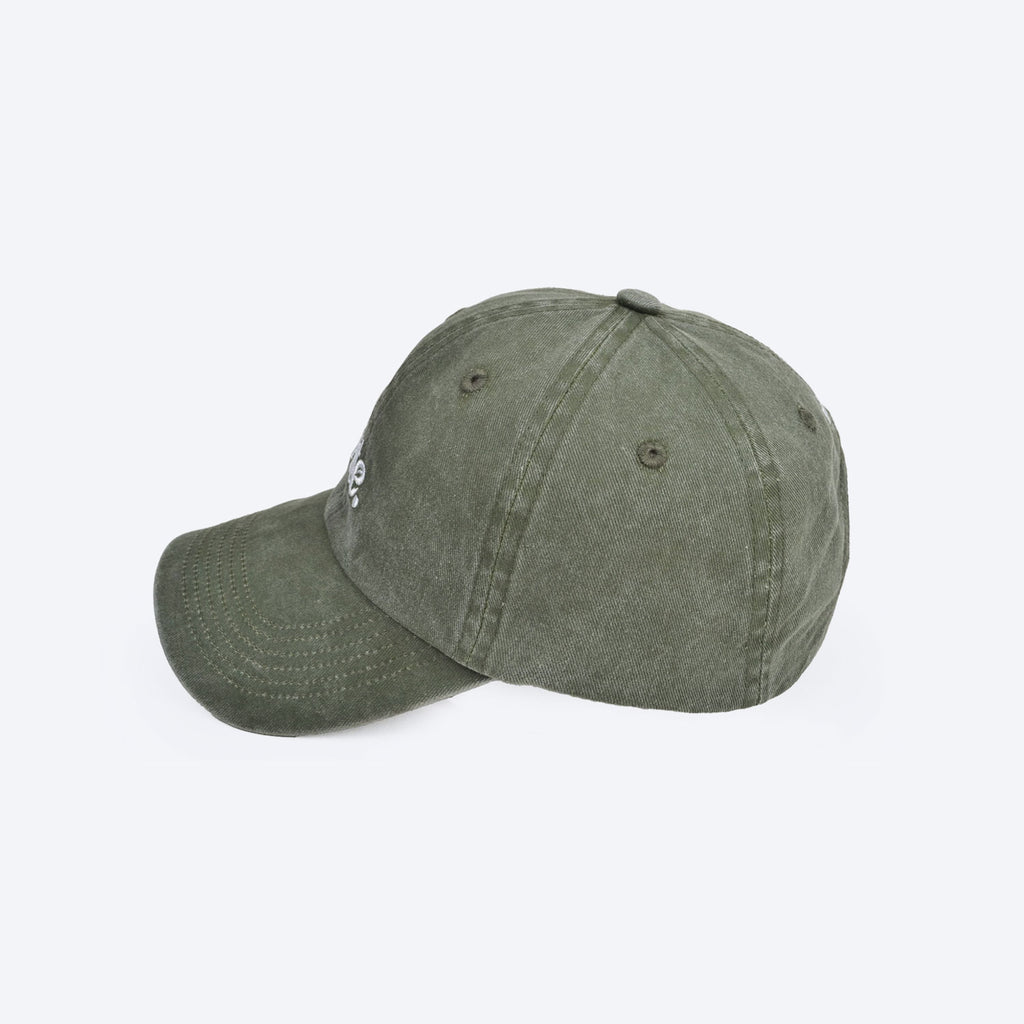 GREEN CAP with white embroidered rite. logo, curved brim, and soft washed fabric for casual wear