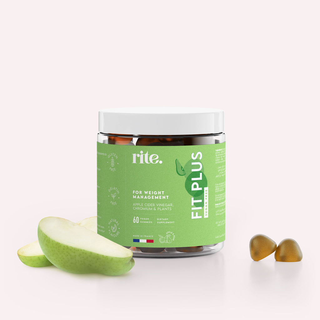 A jar of Rite Fit Plus vegan gummies sits on a table next to a Green apple. 