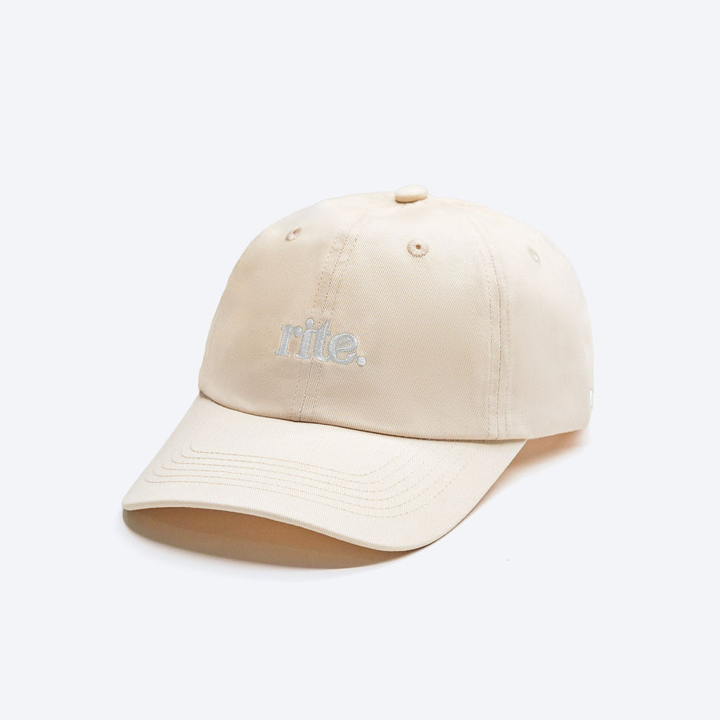 WHITE RITE CAP, soft cotton build with subtle embroidered branding—perfect for daily wear and effortless style.